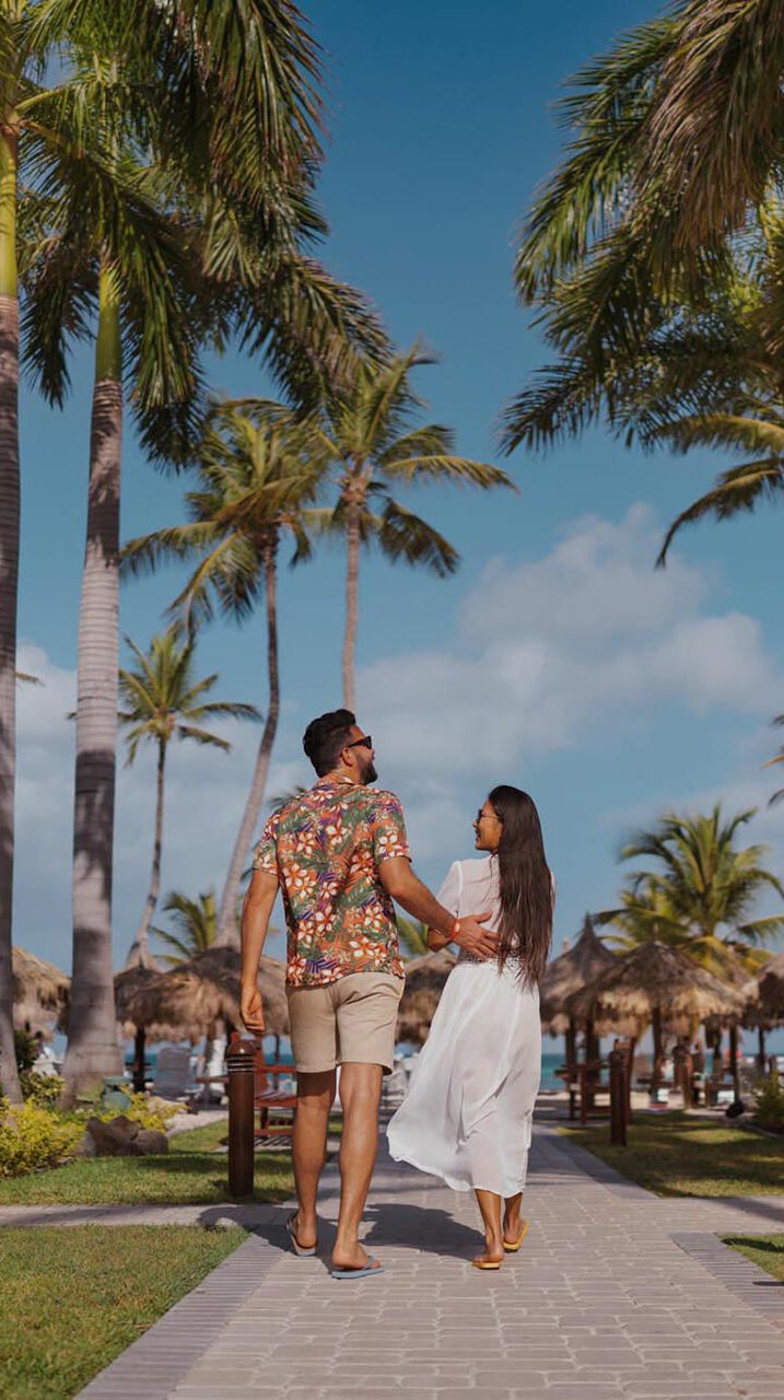 A couple walking through the courtyard